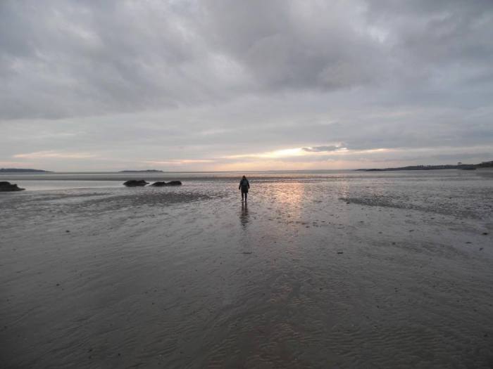 Tracy wanders across the sands in Skyreburn Bay